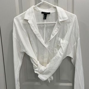 White shirt. Can be tied at bottom